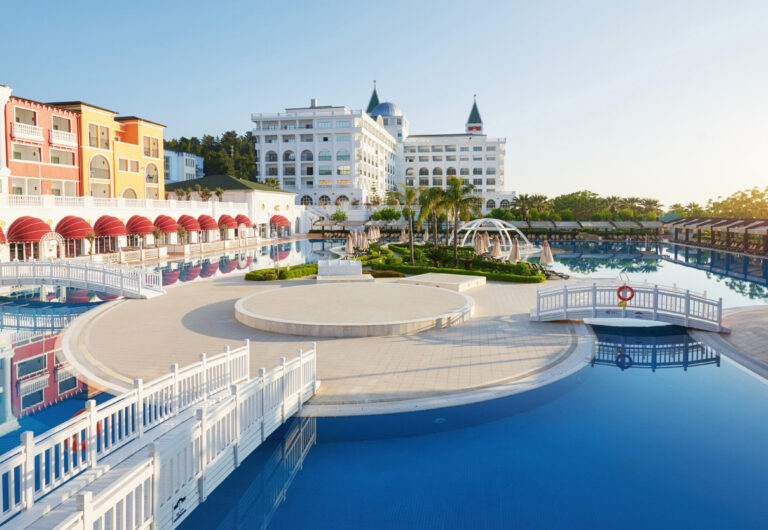 Swimming pool and beach of luxury hotel and outdoor pools and a spa. Amara Dolce Vita Luxury Hotel. Resort. Tekirova-Kemer. Turkey. Cheap Hotels in Doha